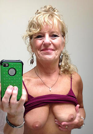 a naked selfshots granny shows us her pussy
