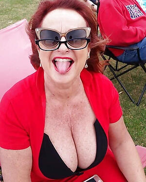 photoshooting with sexy redhead granny porn