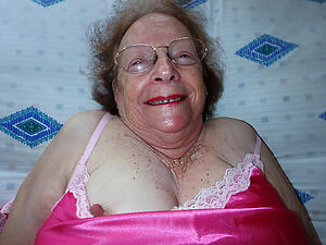 photoshooting with undressed old granny in glasses